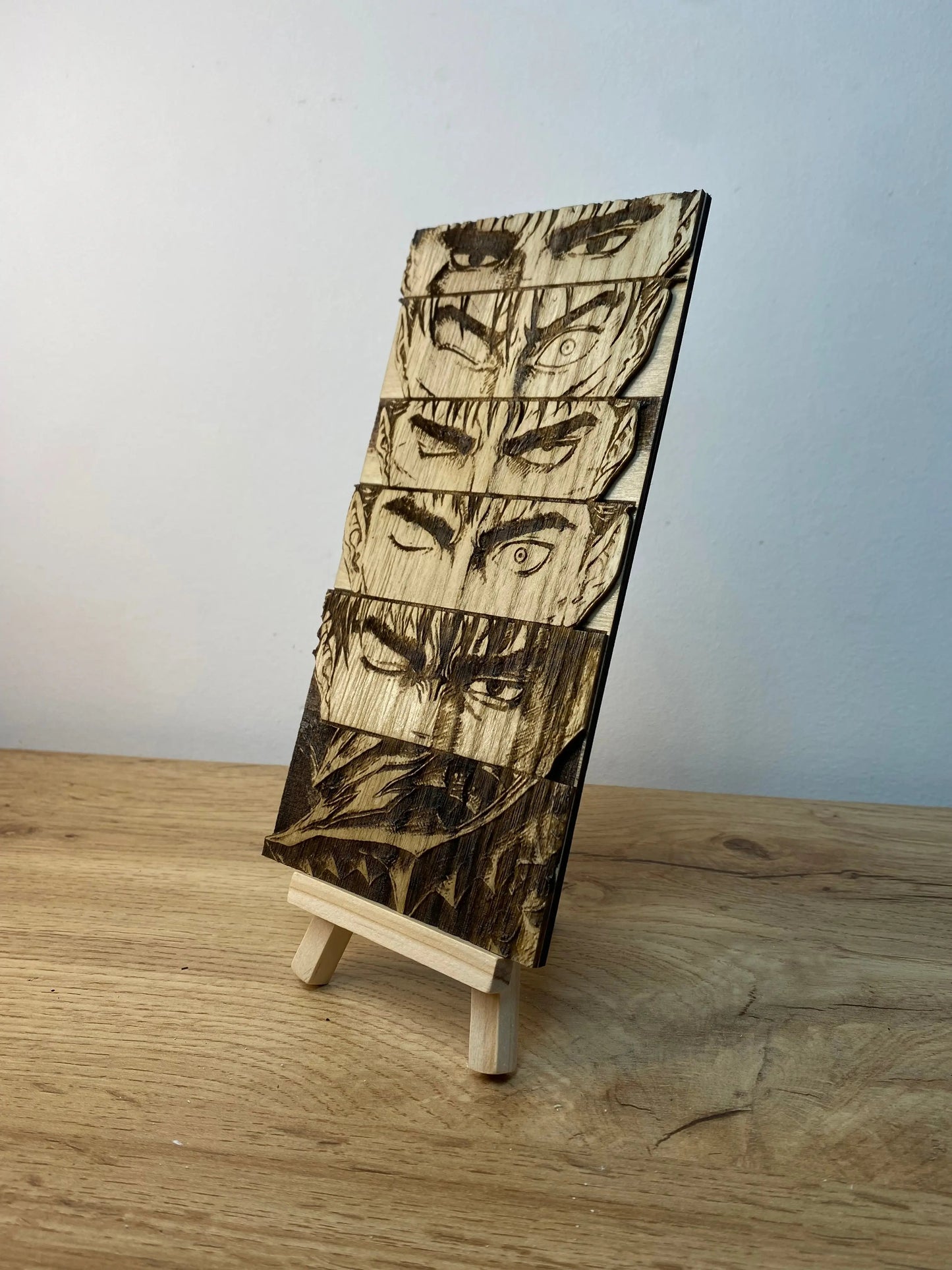 Gravure sur bois berserk – Guts « L’évolution du regard » Bois et Traits