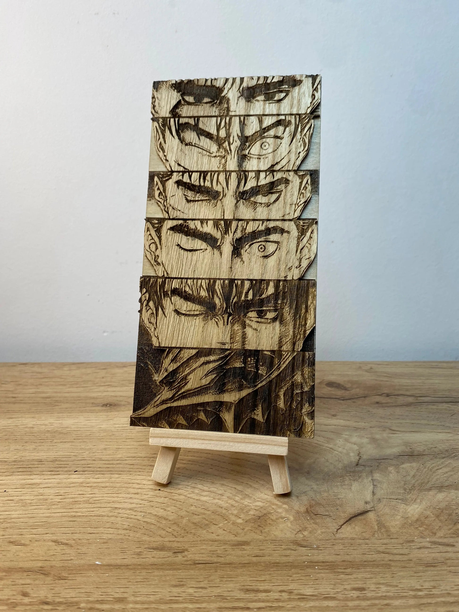 Gravure sur bois berserk – Guts « L’évolution du regard » Bois et Traits